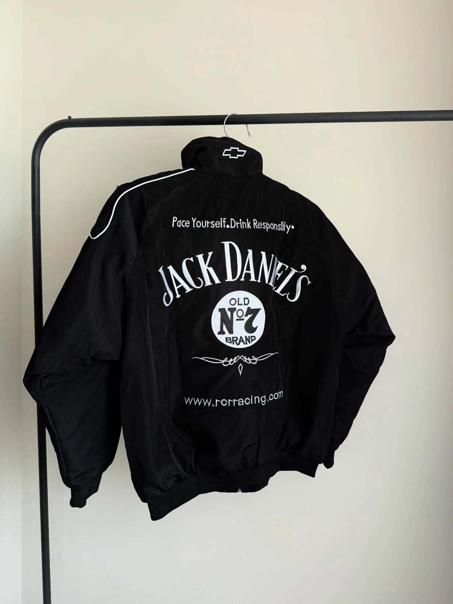 jack daniels f1 jacket, jack daniels racing jacket, jack daniels embroidered jacket, jack daniels moto jacket, black jack daniels jacket, f1 racing jacket india, paper castle jacket, streetwear jacket, oversized streetwear jacket, premium streetwear india, trendy jackets for men, unisex bomber jacket, heavy embroidery jacket, premium quality jacket, biker style jacket, motorsport jacket, formula 1 jacket, racing team jacket, motorsports apparel, f1 fan merchandise, best jackets for men india, affordable rac